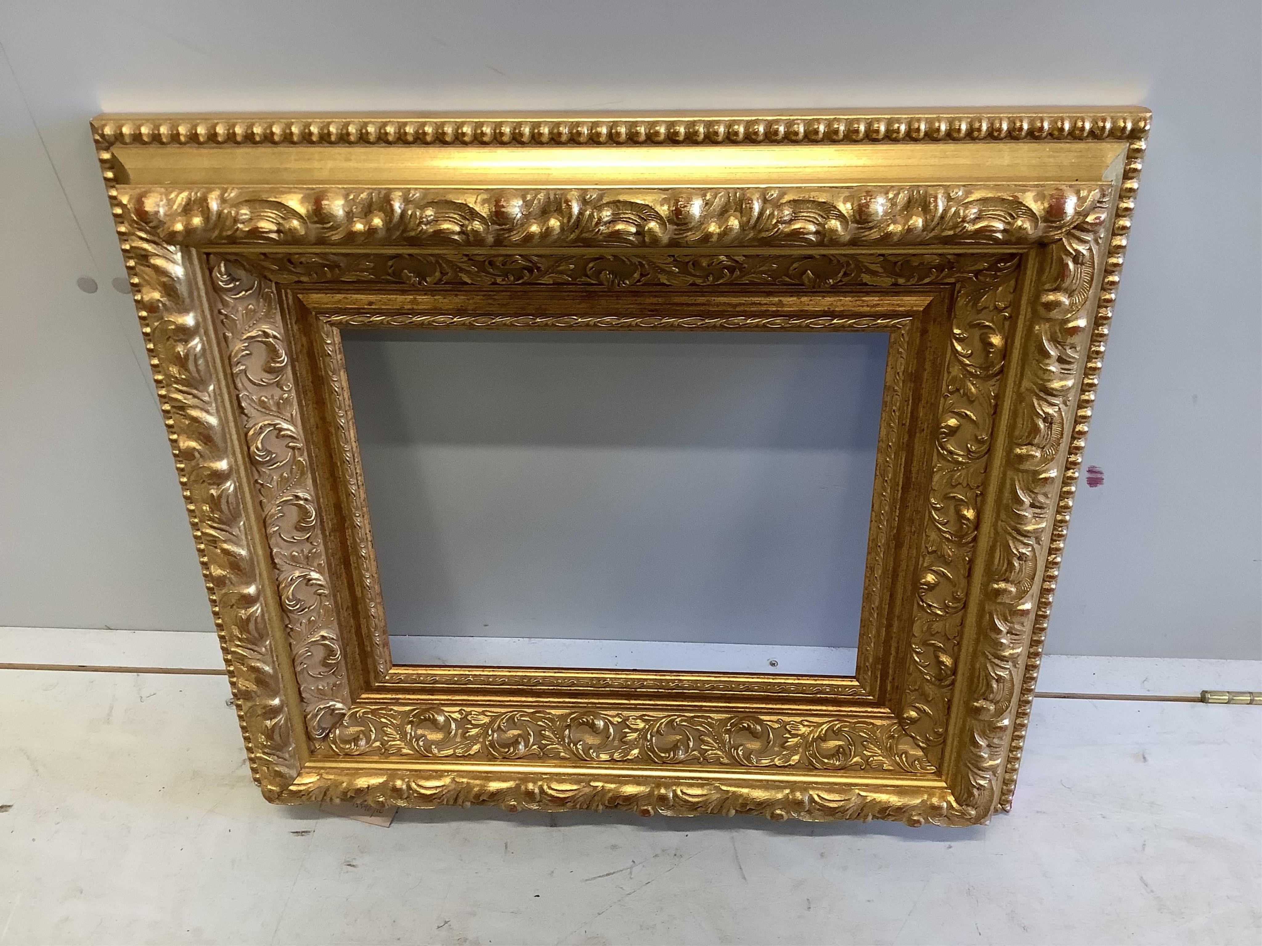 Two Victorian style rectangular gilt frames, larger width 69cm, height 78cm. Condition - fair to good